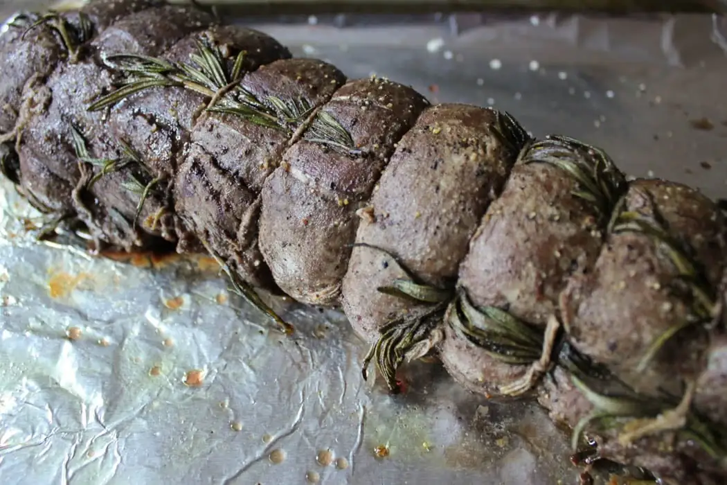 rosemary in kitchen with roasted meat