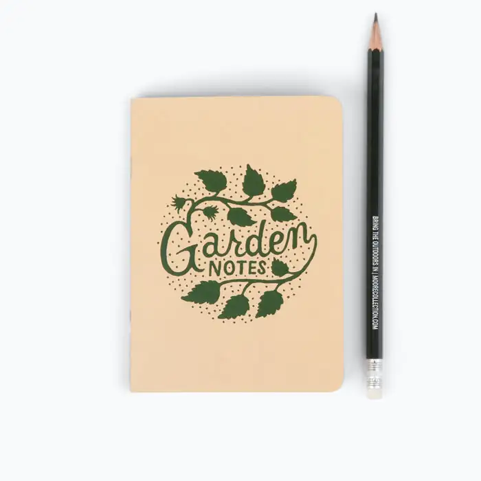 notebook with plant growth notes