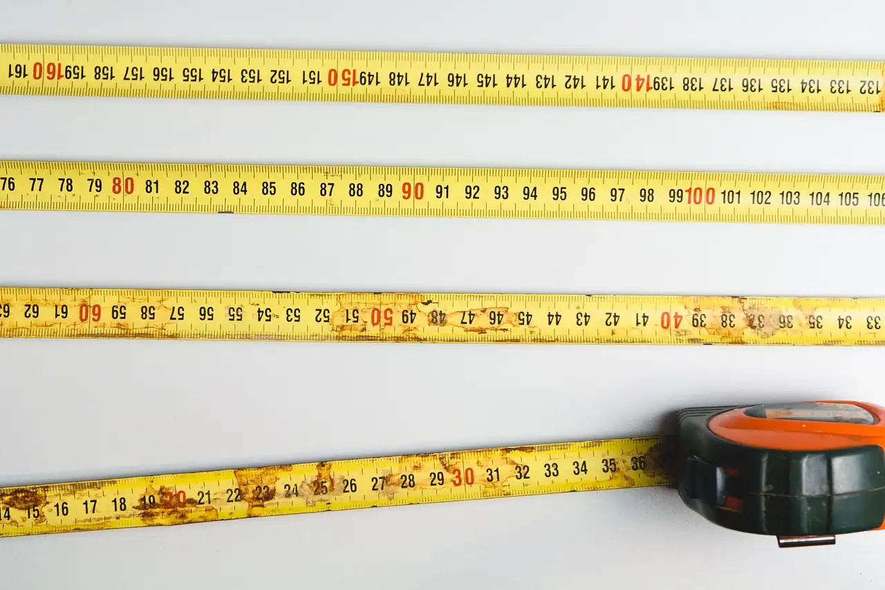 measuring plant height with tape