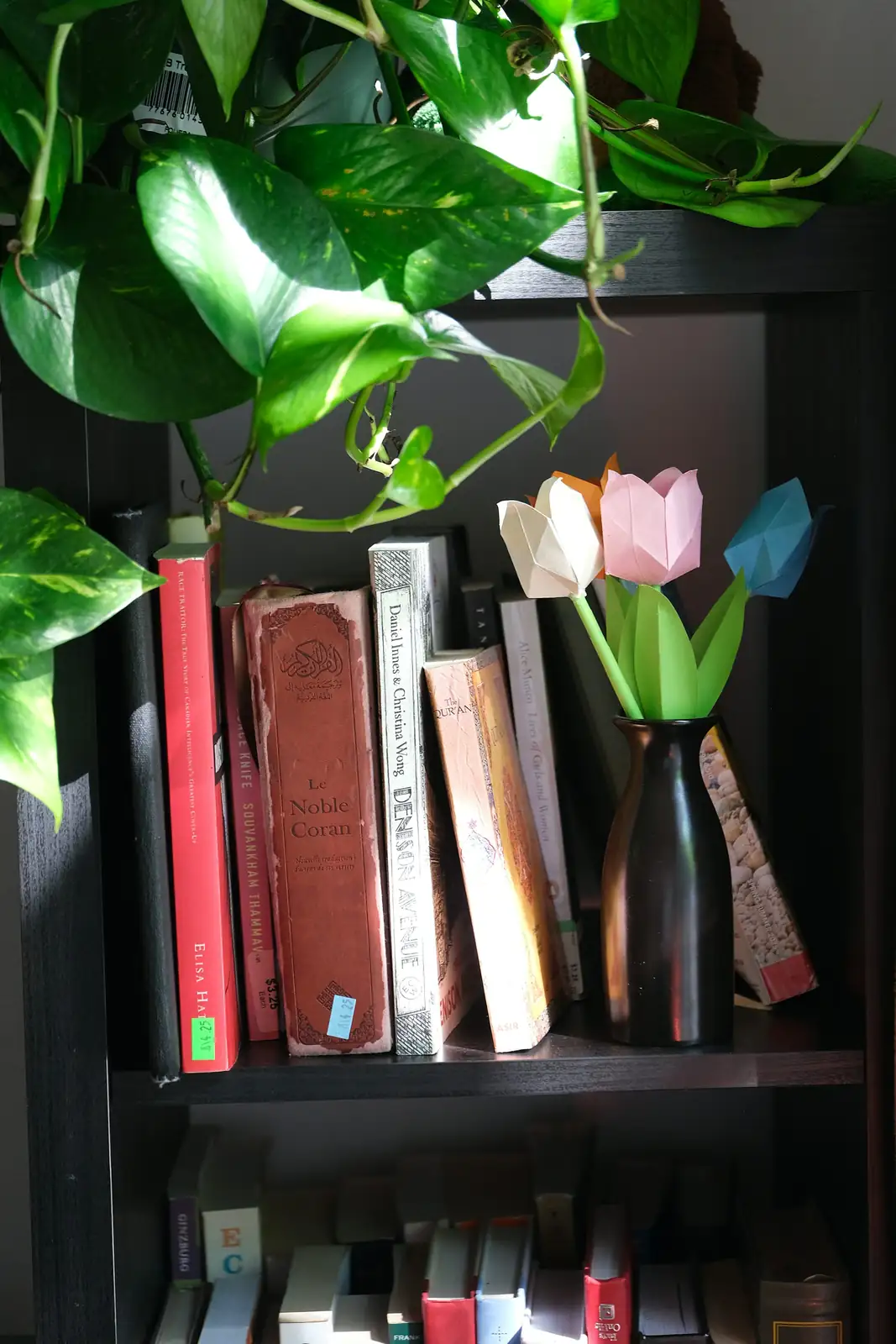 tulips on vintage bookshelf