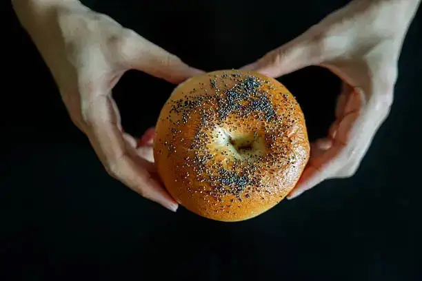 poppy seeds on a bagel close-up