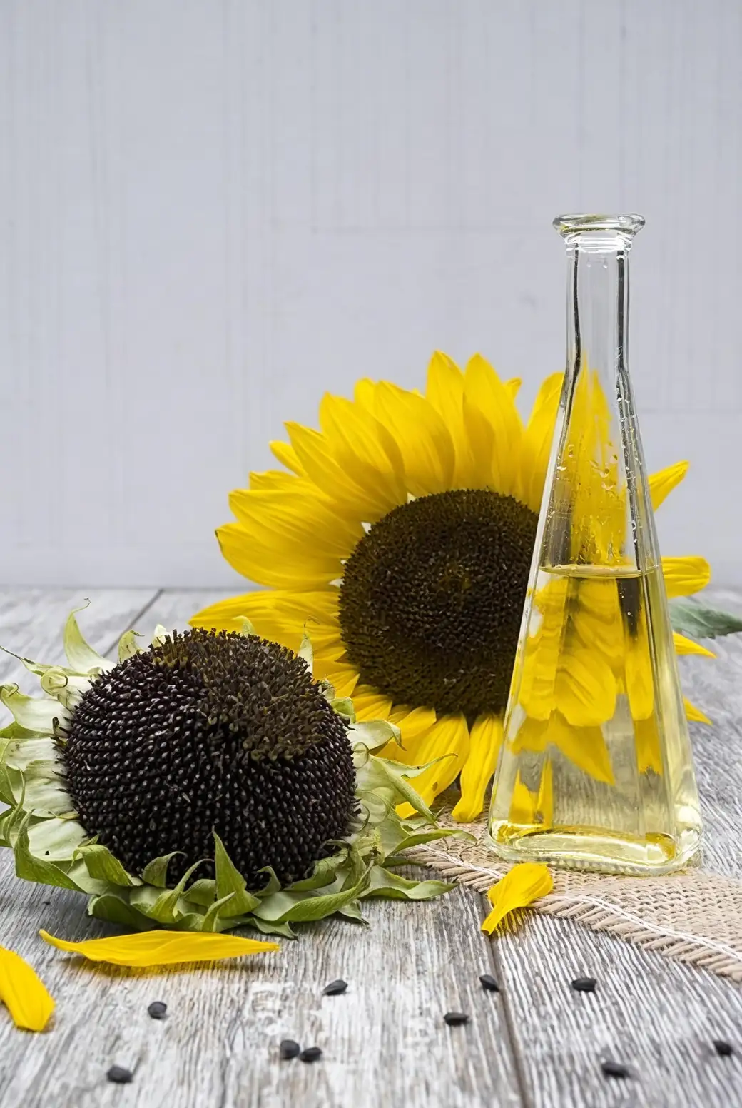 sunflower seeds and oil bottle