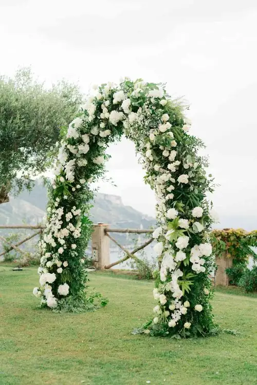 white clematis wedding arch