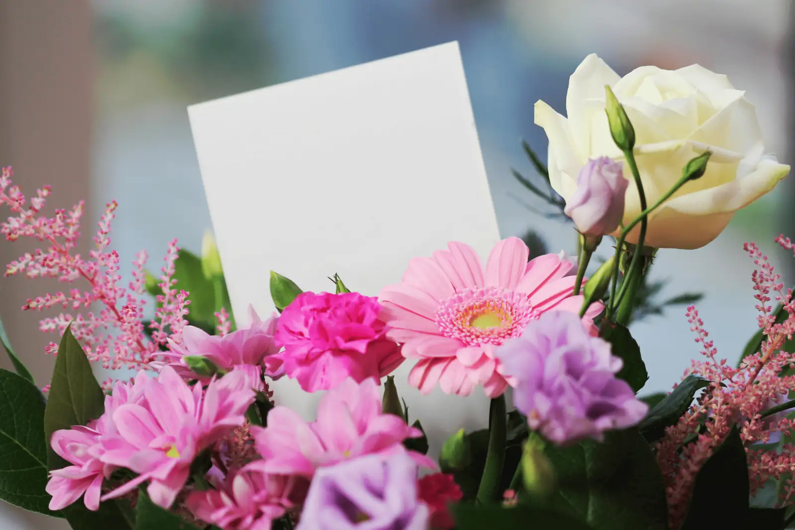 rose bouquet with handwritten card