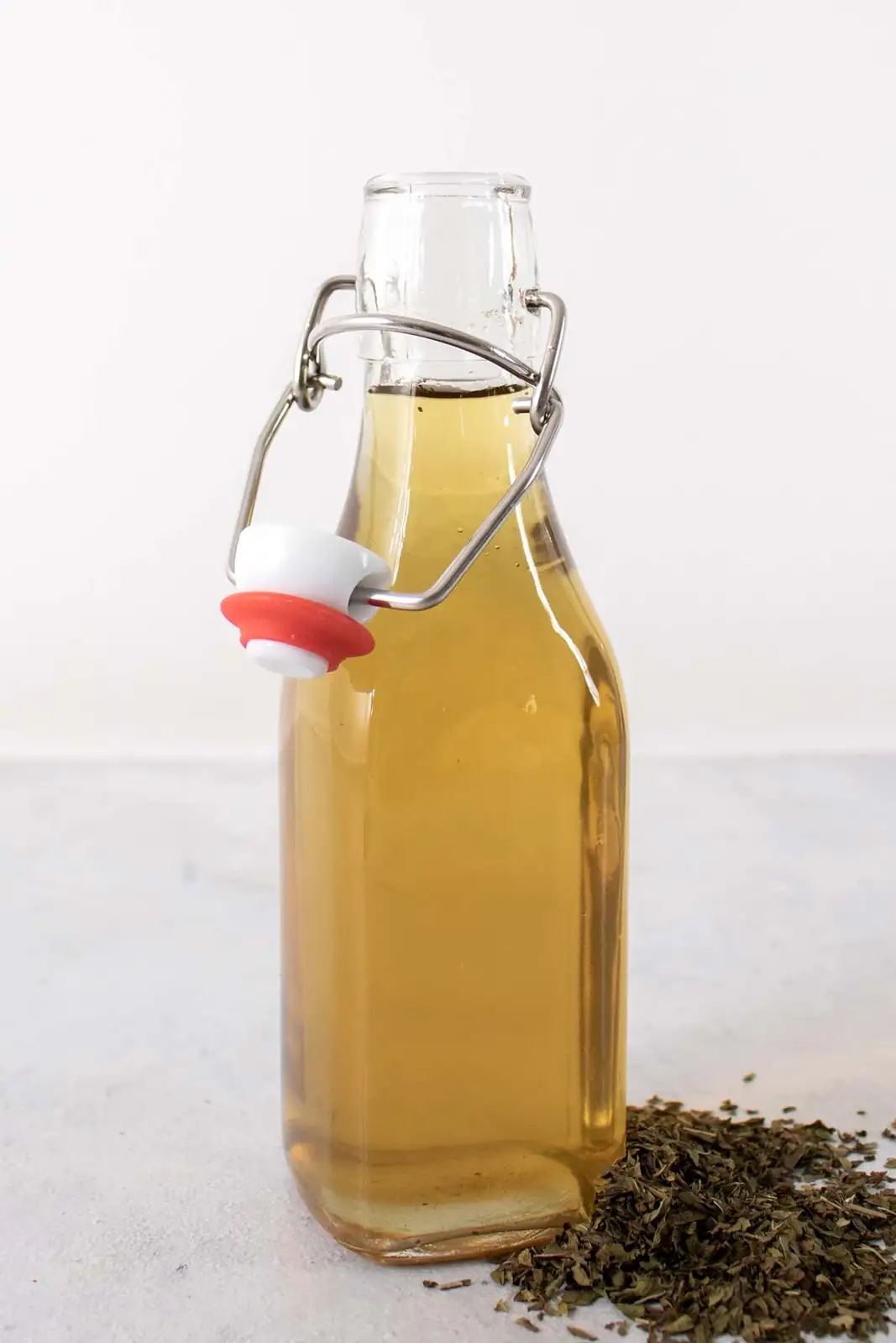 peppermint simple syrup in glass bottle