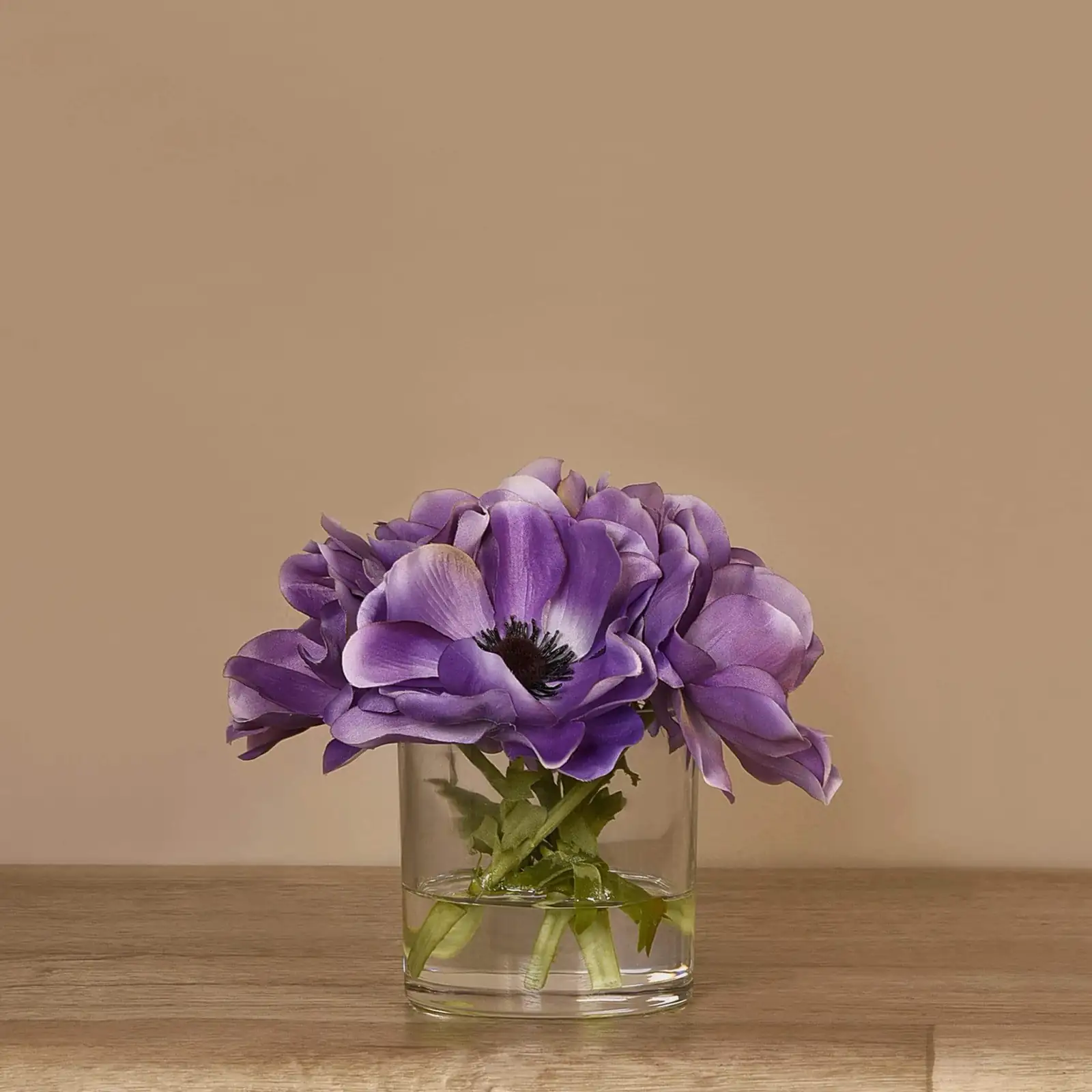 anemone coronaria vase arrangement close-up