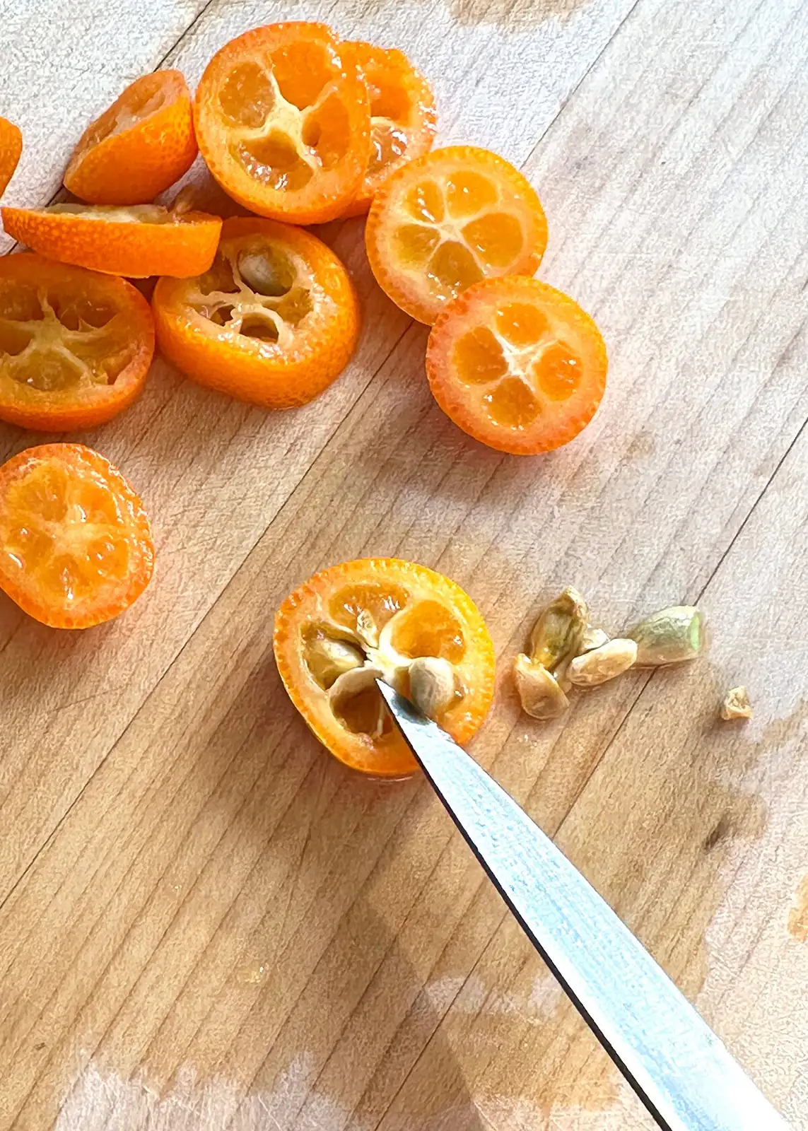 kumquat slices deseeding paring knife