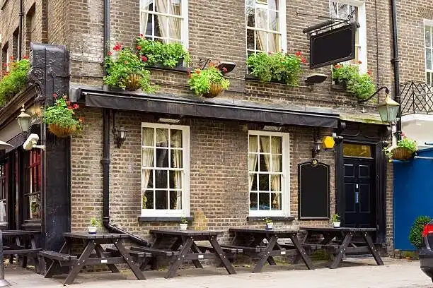 english ivy tavern sign england