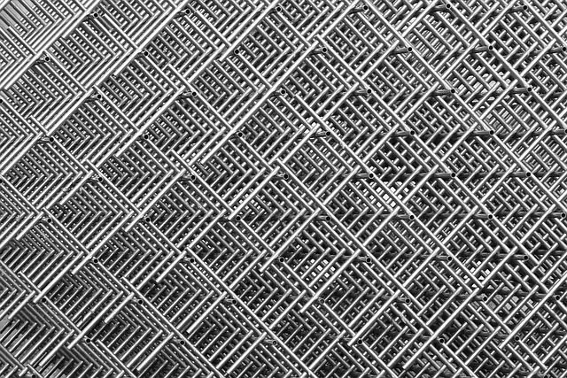 pumice grit in wire mesh sieve