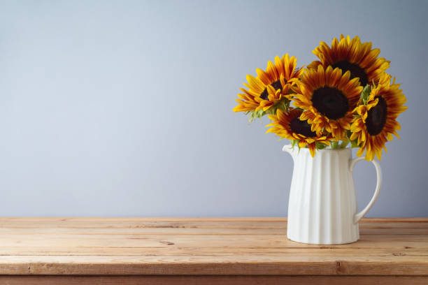 sunflower bouquet glass vase table