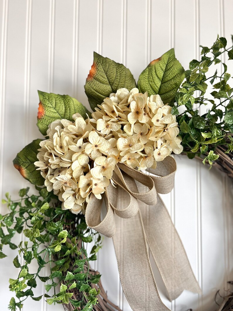 hydrangea wreath on grapevine door