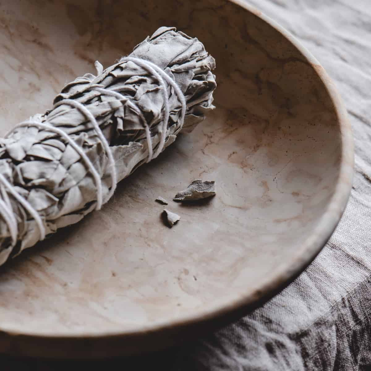burning sage herb bundle at home