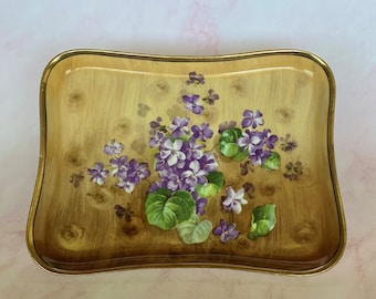 violet flowers on vintage vanity