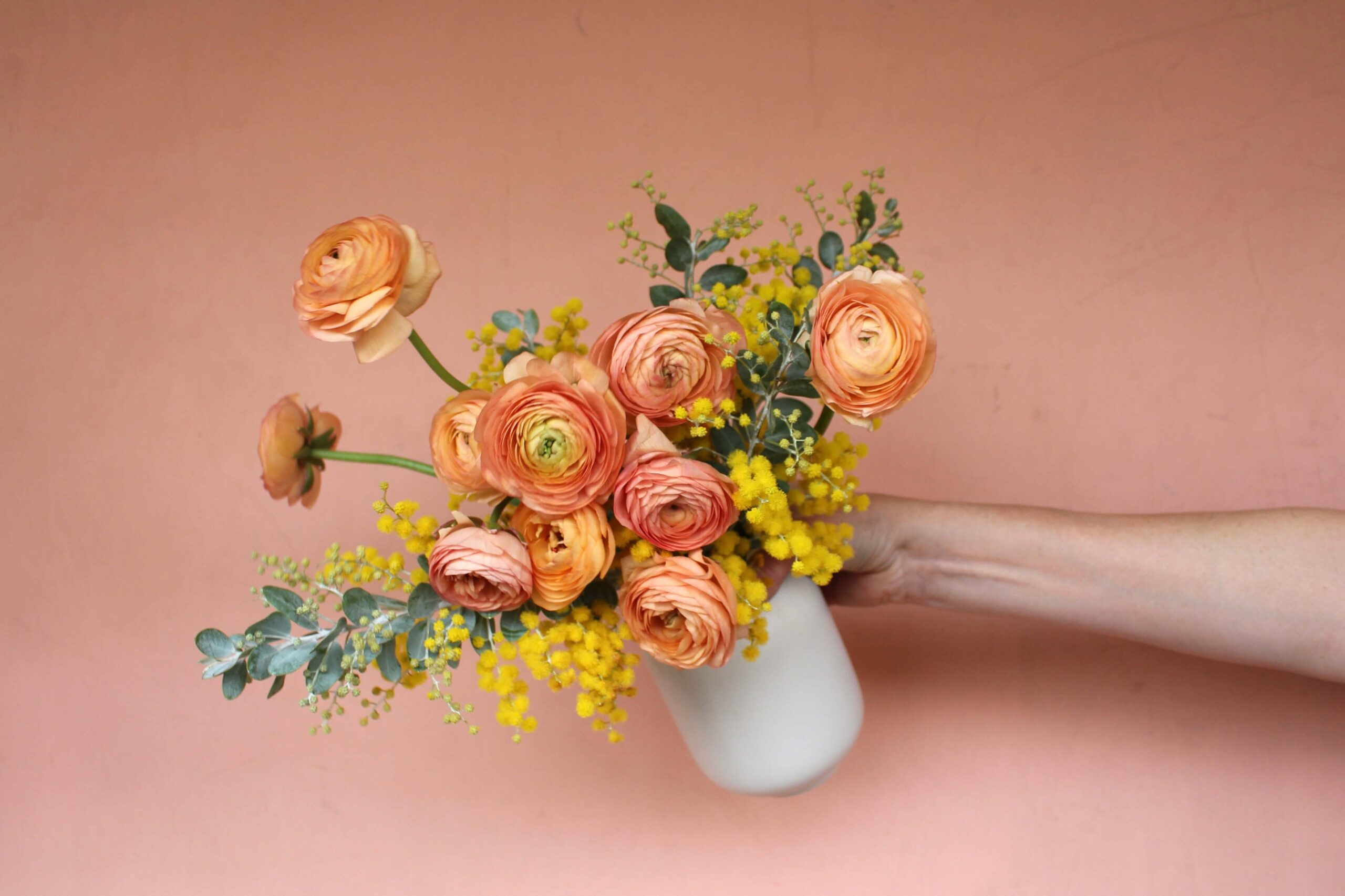 ranunculus vase on mantel