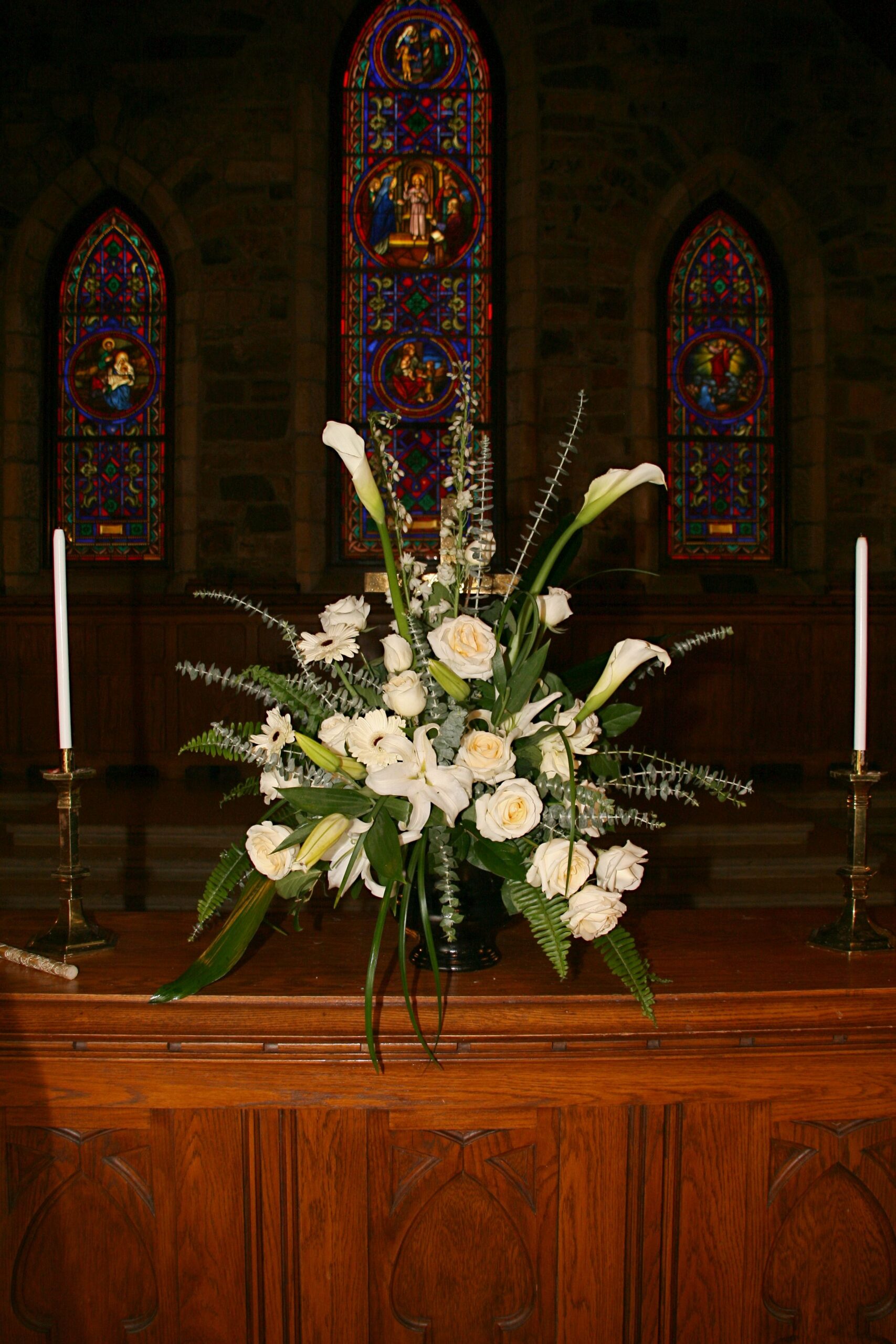 white calla lilies church altar