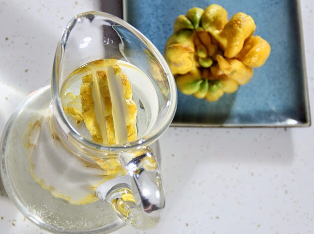 buddha's hand infused water glass