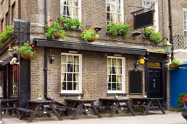english ivy tavern sign england